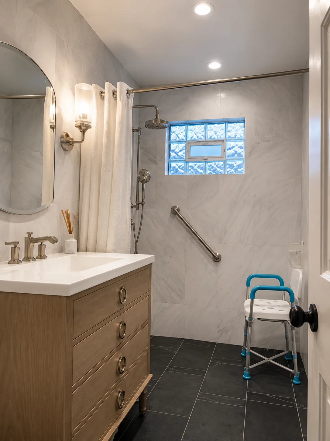 Accessible Kildeer bathroom with walk-in shower, grab bar, handheld shower, and shower chair