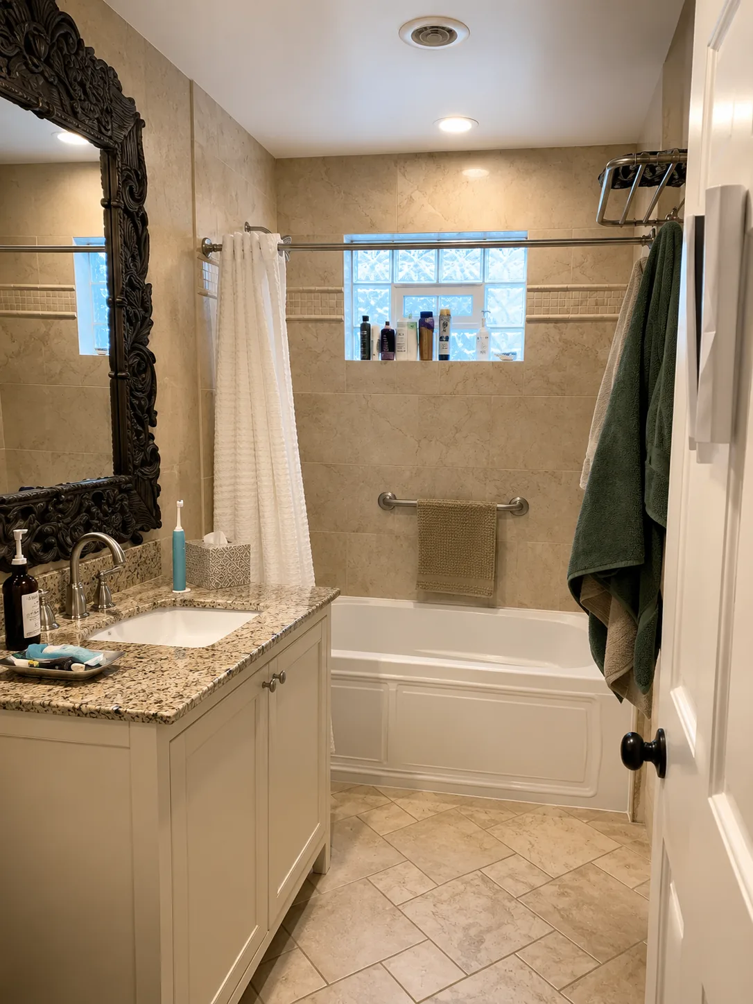 Kildeer bathroom before remodeling with a high-sided bathtub and restricted bathing access