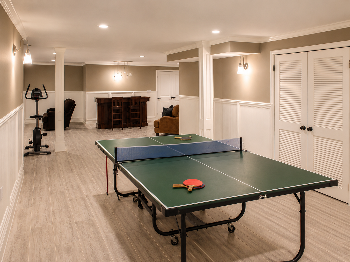 Highland Park finished basement recreation room with game area and wet bar