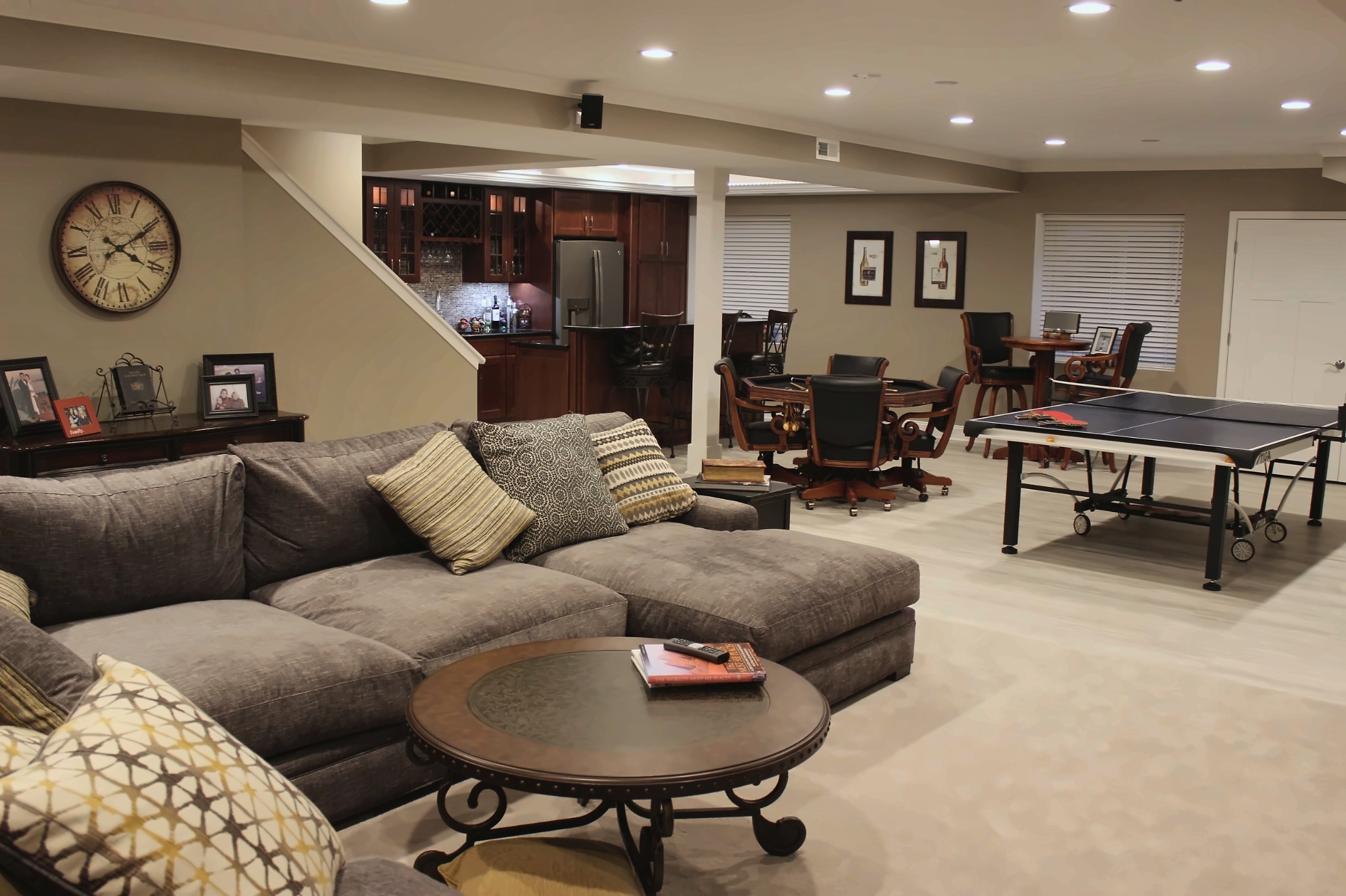 Vernon Hills basement lounge with game area, wet bar, and open family room