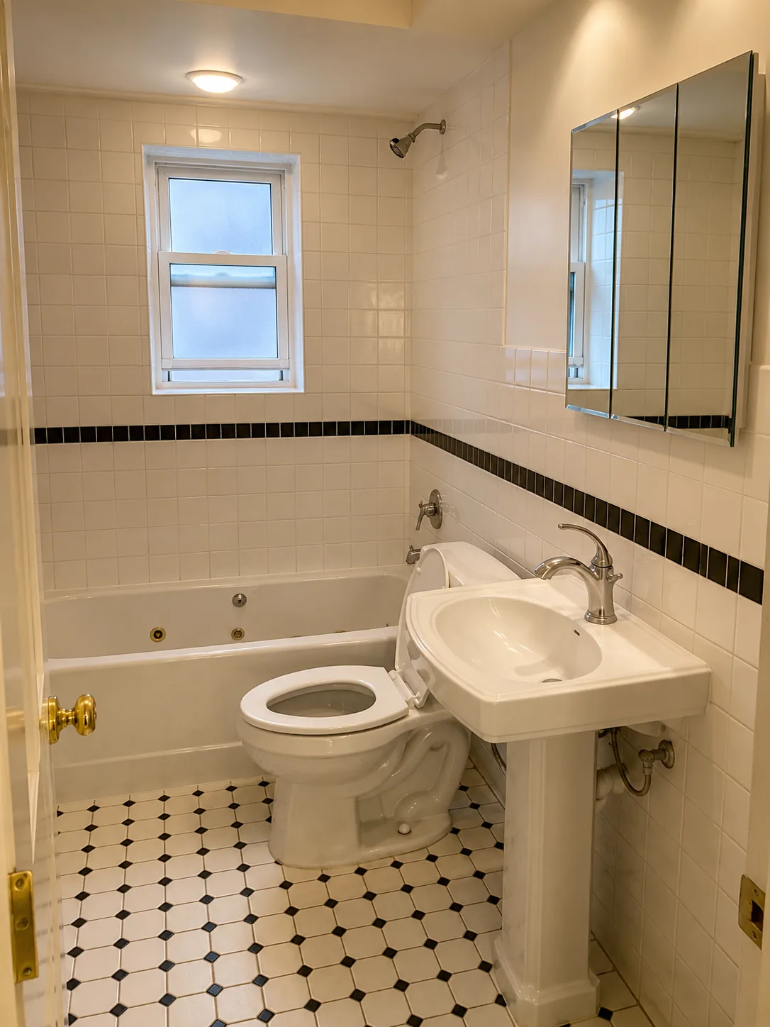 Evanston Bathroom Remodel with Arched Pocket Door, Brass Fixtures and Linear Drain before remodeling