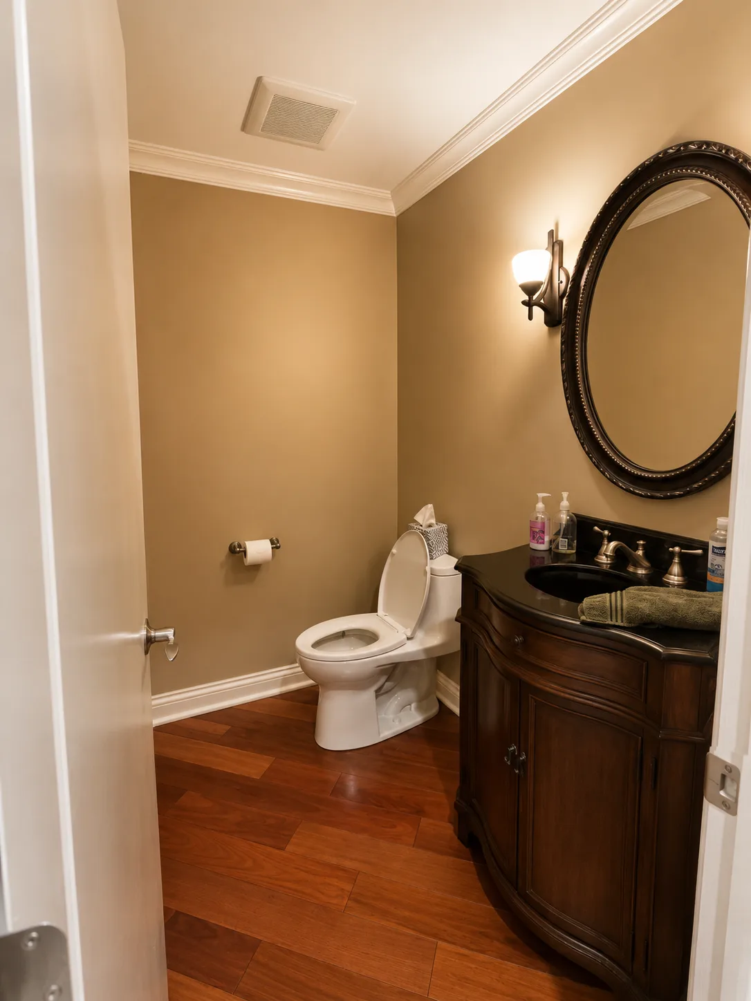 Lake Bluff Powder Room Remodel with Floating Marble Vanity and Round Mirror before remodeling