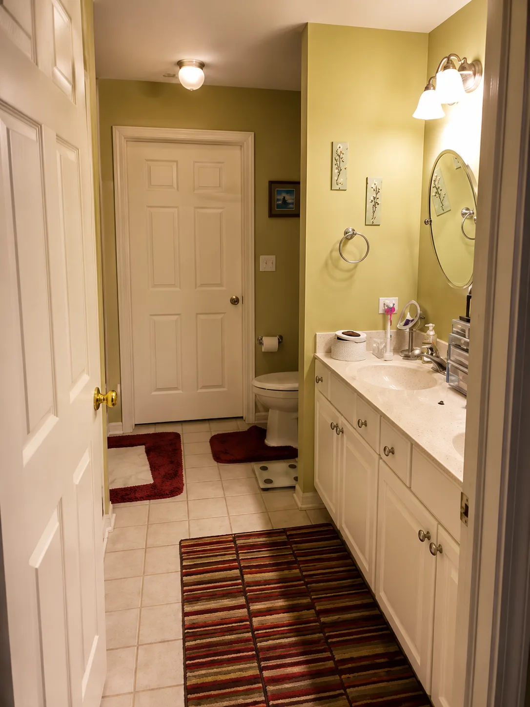 Vernon Hills Bathroom Remodel with Walk-In Shower, Dark Wood Vanity and Herringbone Floor before remodeling