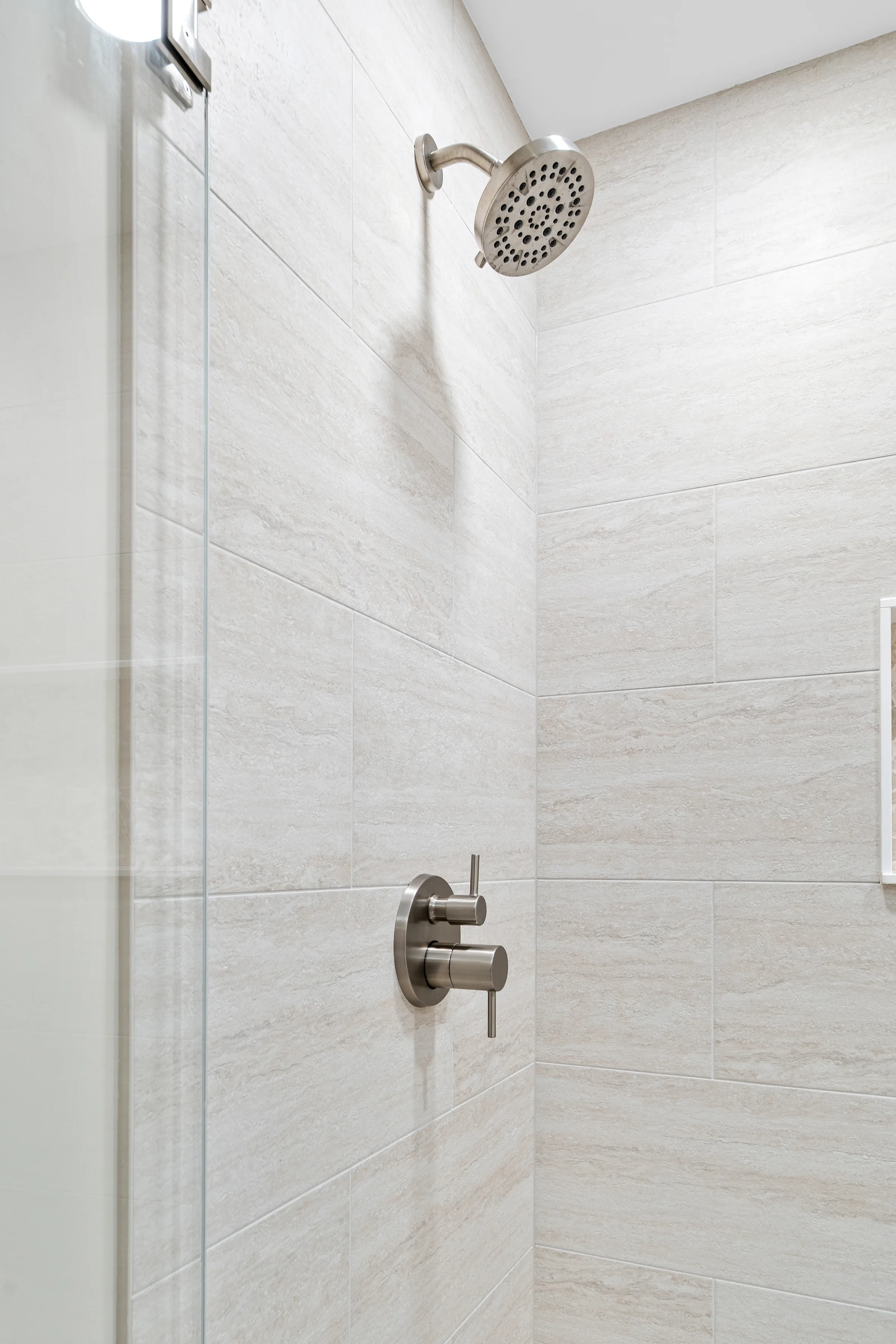Lake Zurich bathroom remodel: pendant lighting over vanity