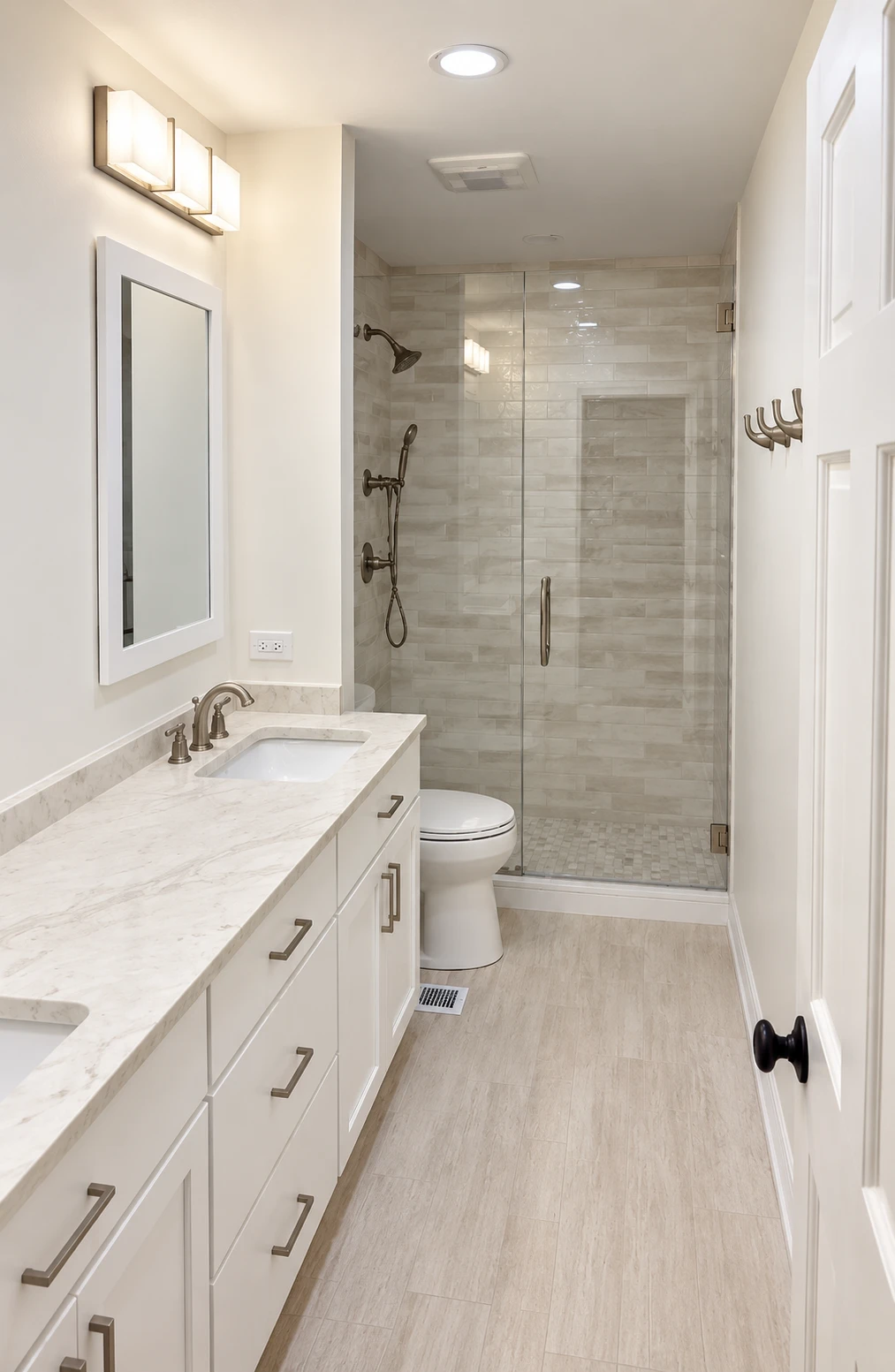 Second full bathroom in Long Grove with a white double vanity, marble-look countertop and tiled walk-in shower