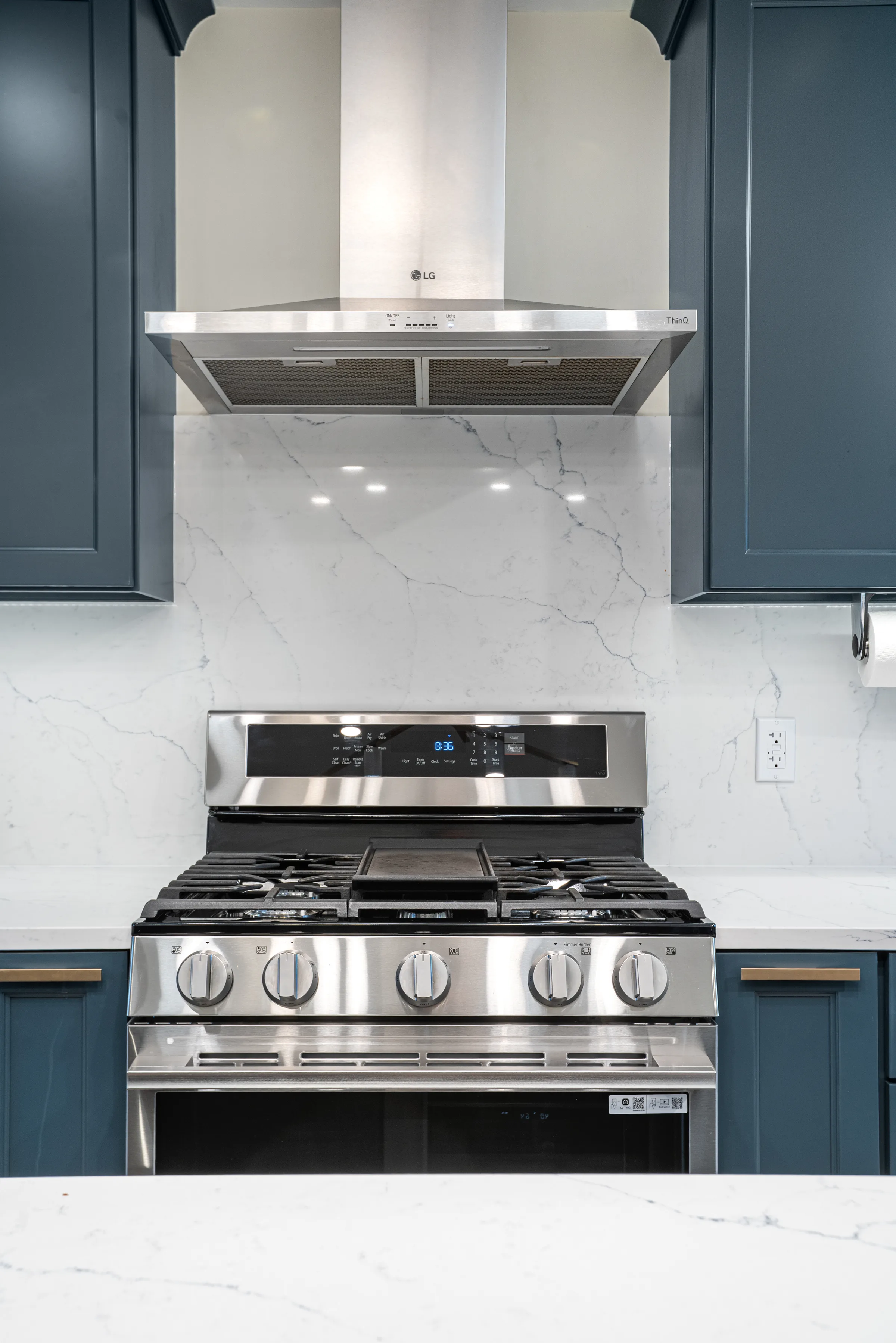 Lake Forest powder room remodel: tile flooring and vanity base