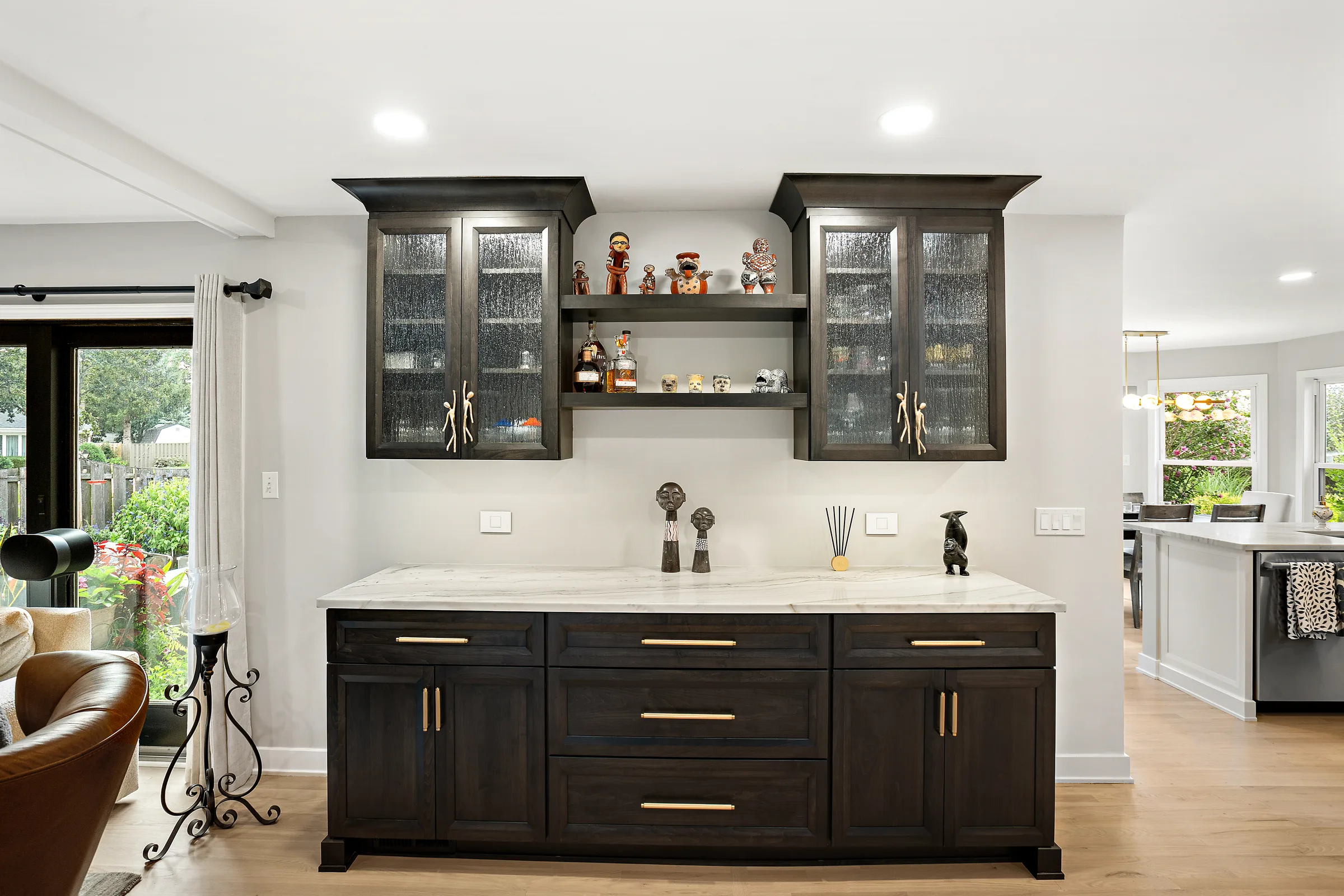 Glenview kitchen remodel: brass pendant cluster over marble island