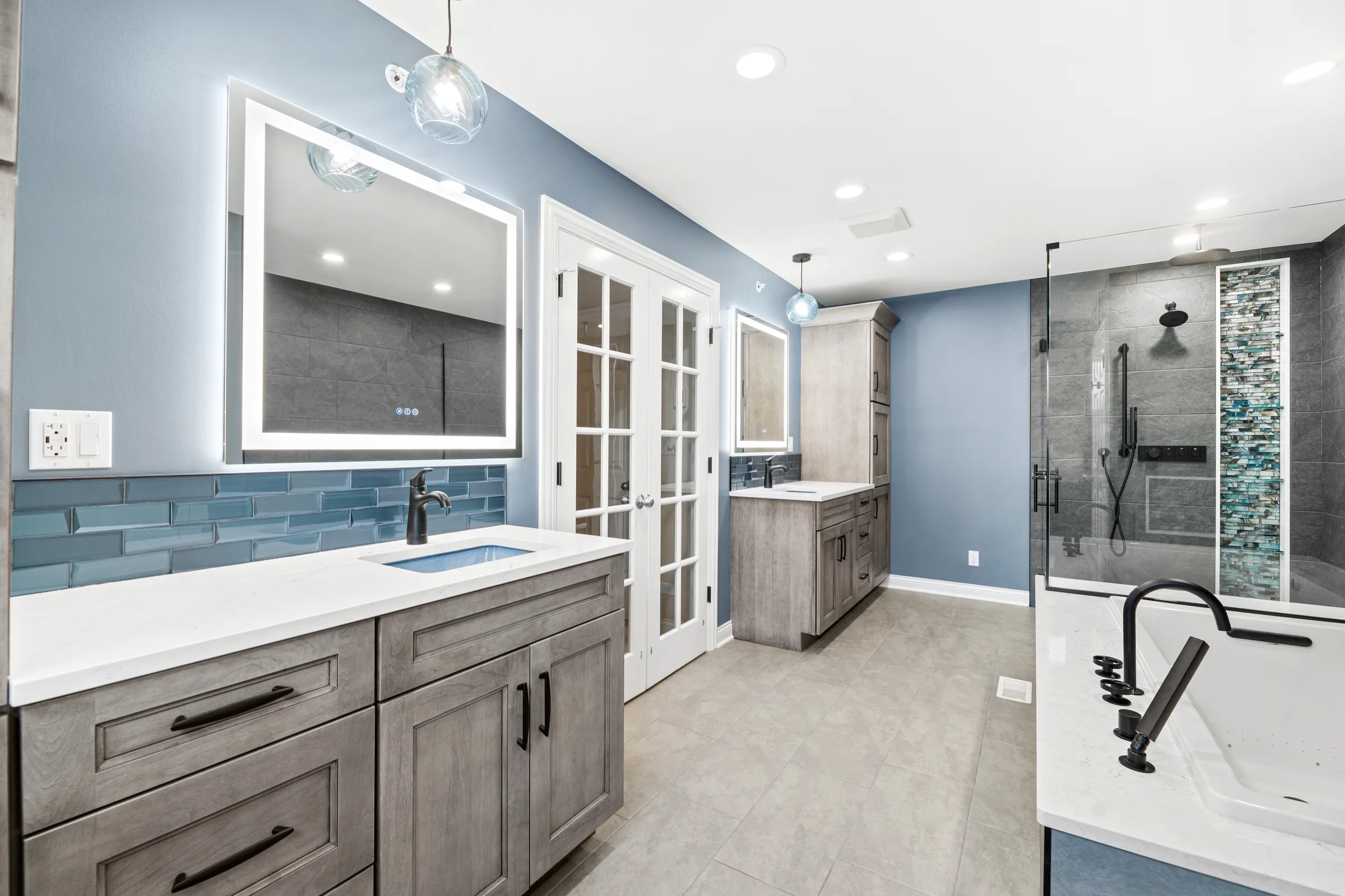 Mount Prospect spa bathroom: drop-in tub and mosaic niche detail