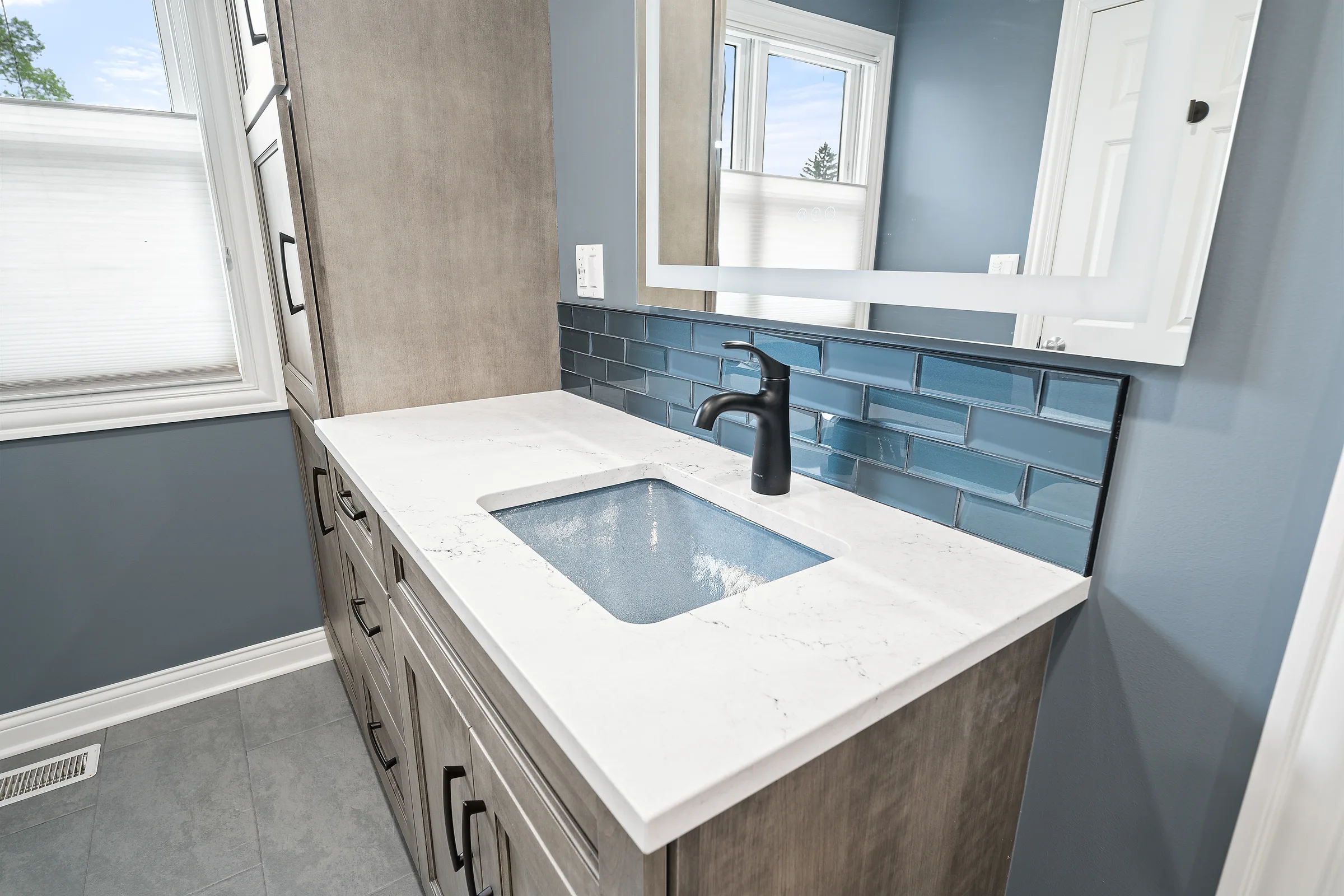 Mount Prospect spa bathroom: slate shower wall and fixture detail