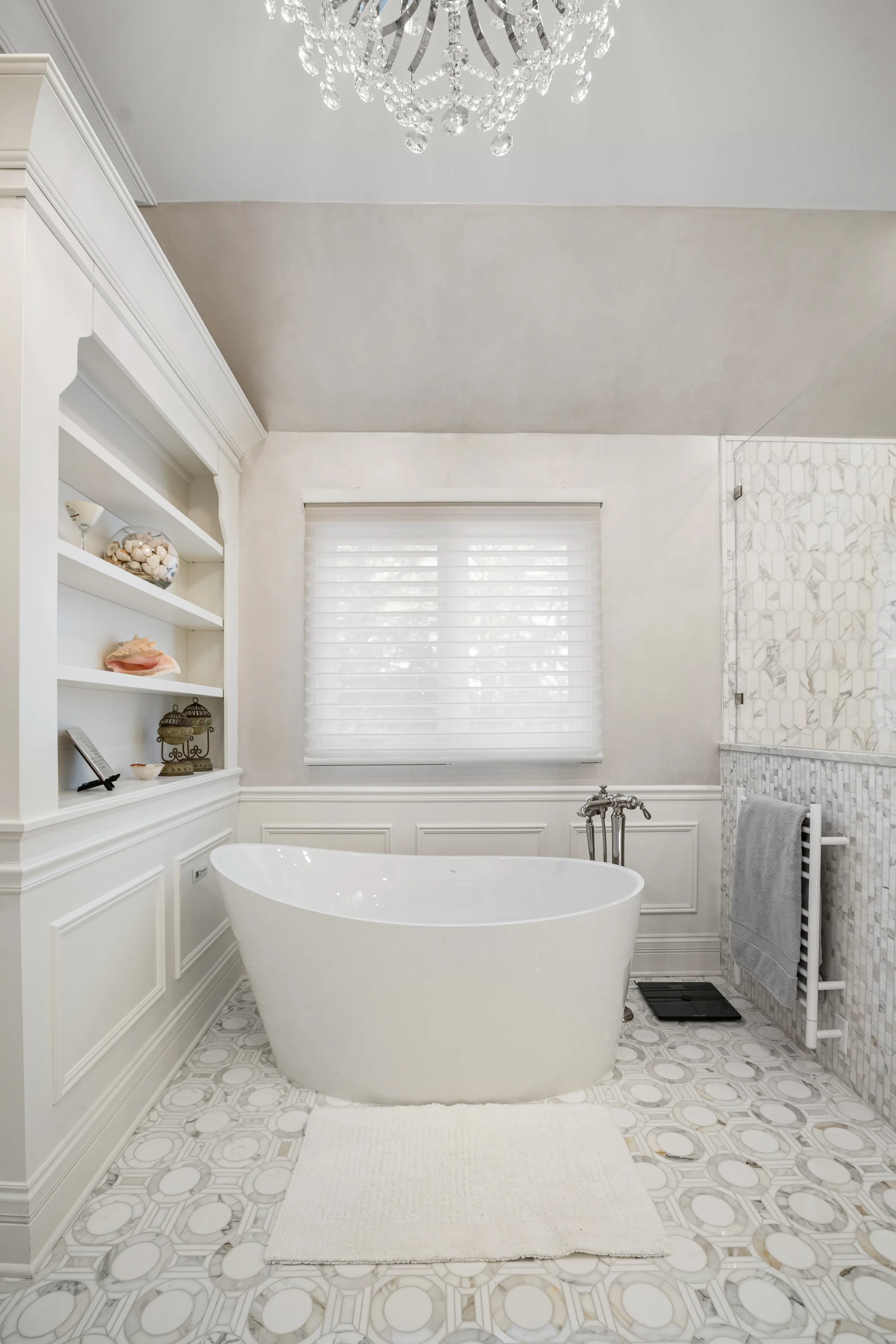 Lake Forest bathroom remodel: freestanding tub with marble surround