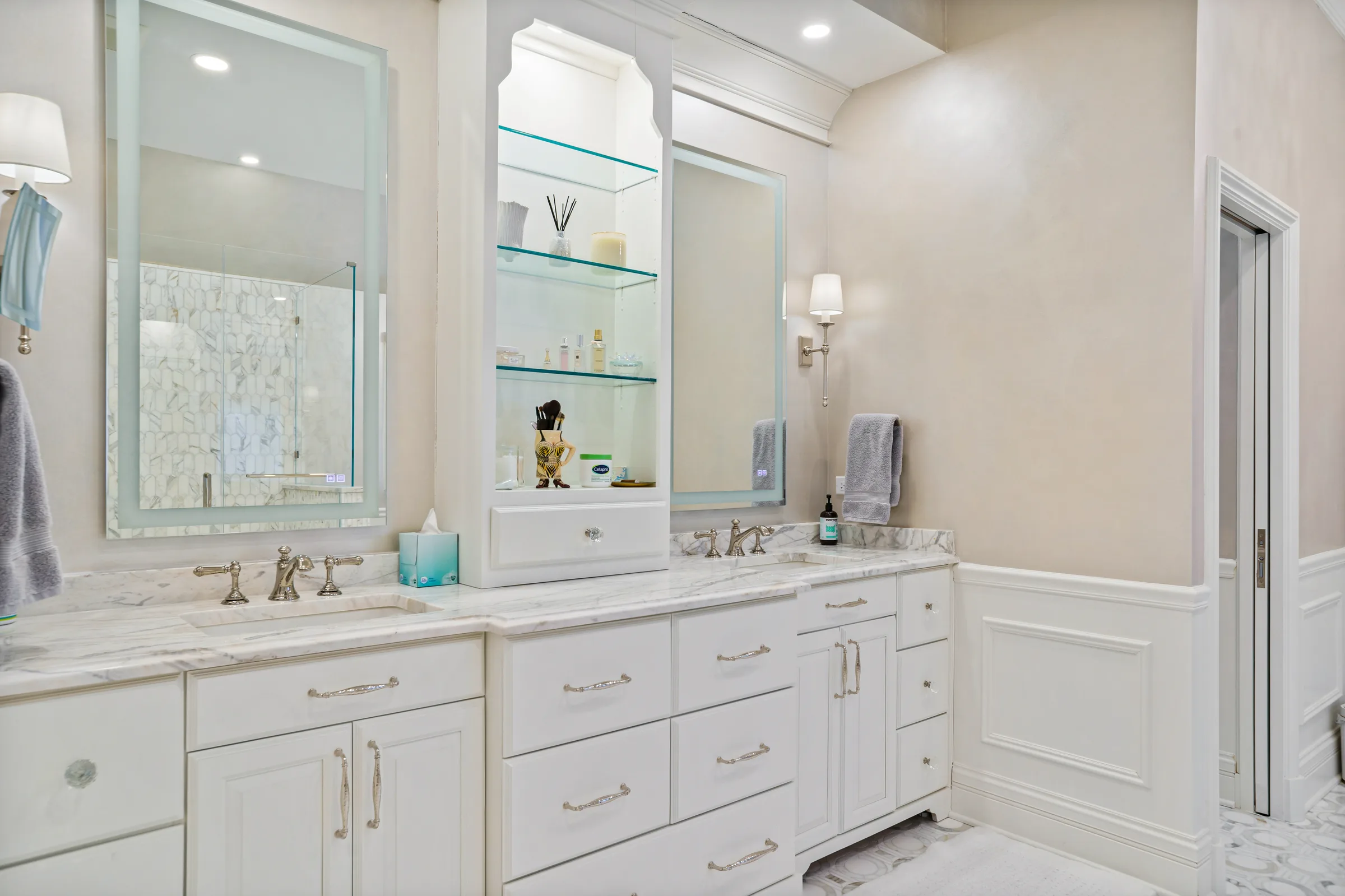 Lake Forest bathroom remodel: marble countertop and brass fixture close-up