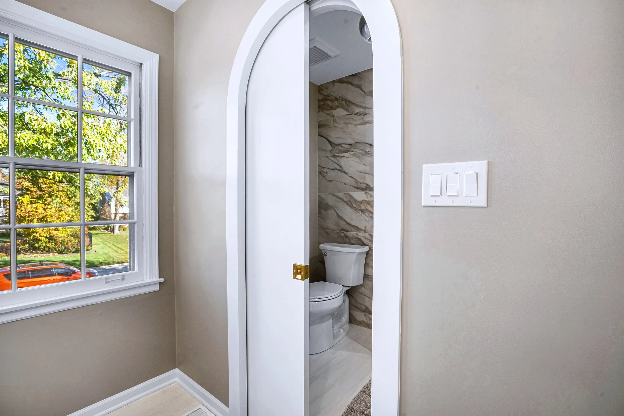 Lake Forest Bathroom Remodel: curved bathroom door delta remodels illinois lake forest