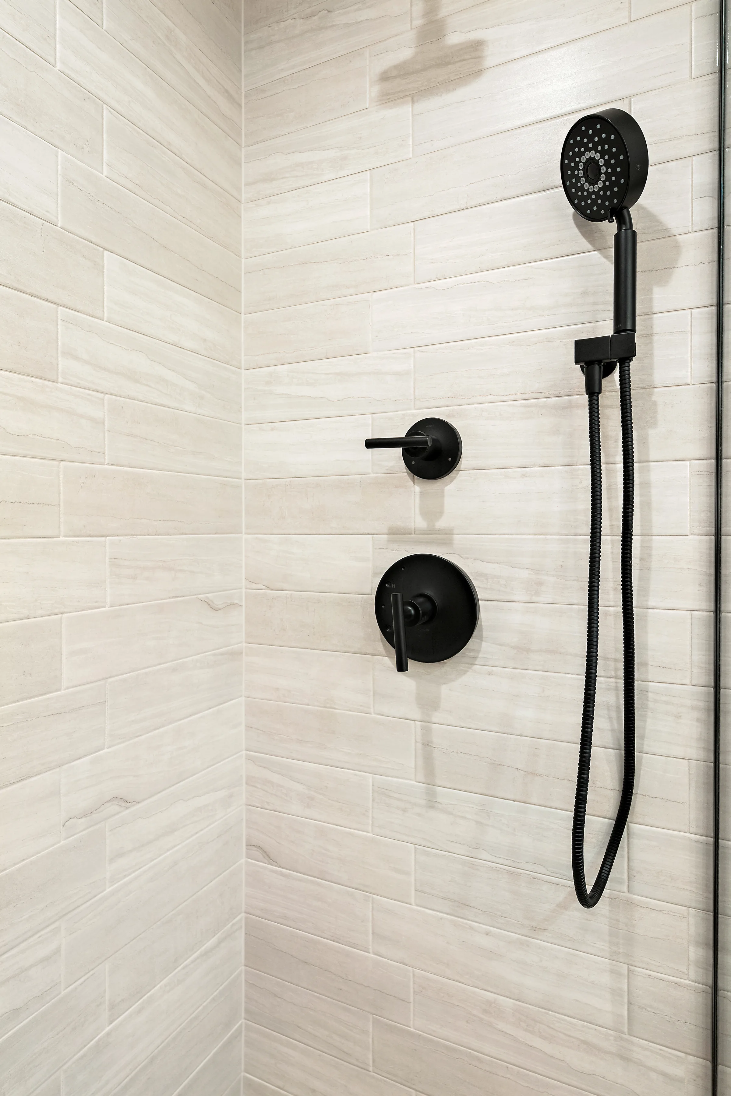 Northbrook bathroom remodel: bronze faucet and quartz counter detail