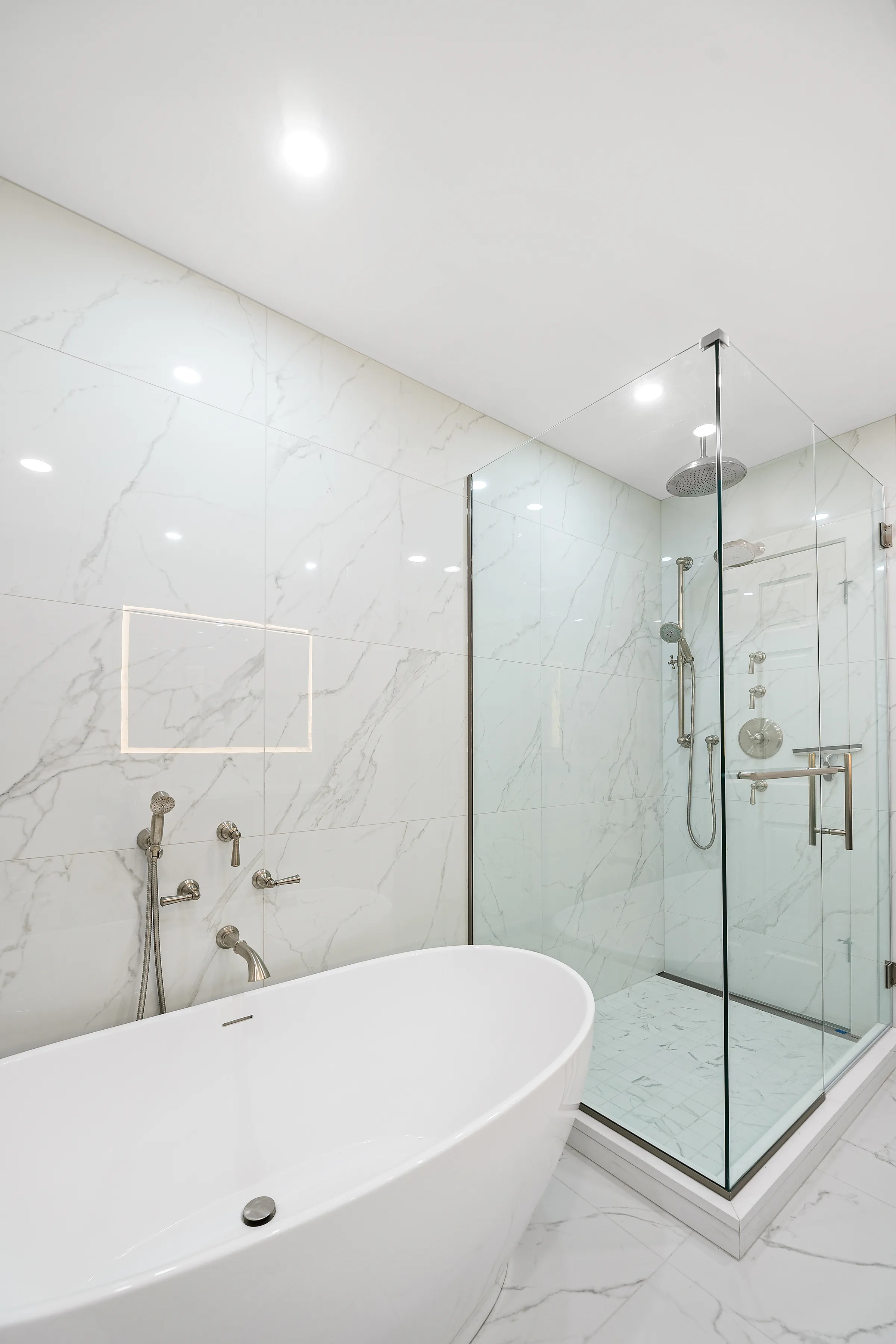 Lake Bluff bathroom remodel: frameless glass shower enclosure