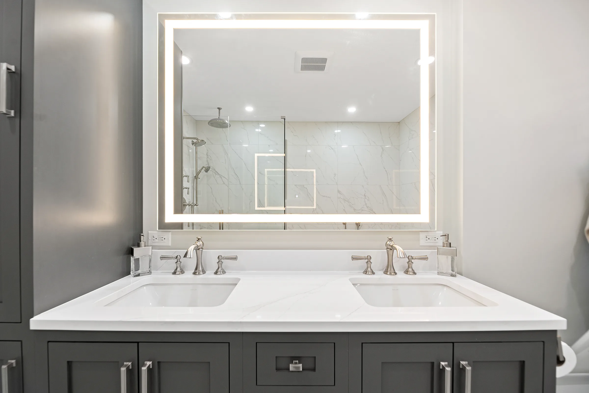 Lake Bluff bathroom remodel: glass shower and freestanding tub composition